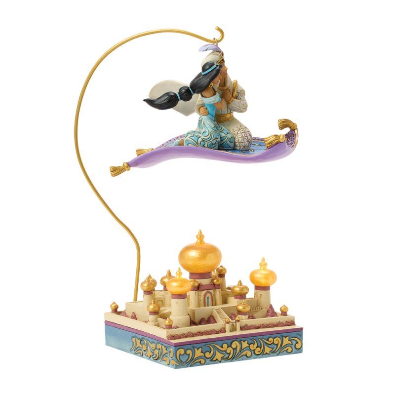Aladdin op een magisch tapijt, boven een gedetailleerde sculptuur van het paleis van Agrabah.