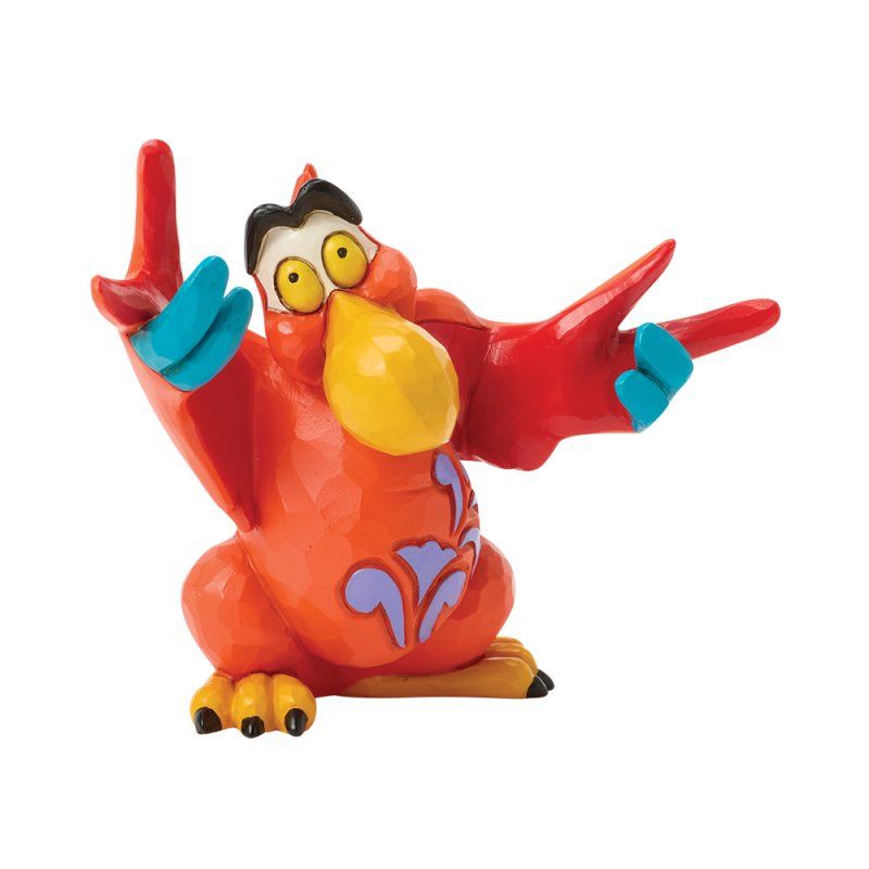 Rood, cartoonachtig vogelbeeldje met uitgestrekte vleugels, blauwe uiteinden, gele snavel en paarse versieringen.