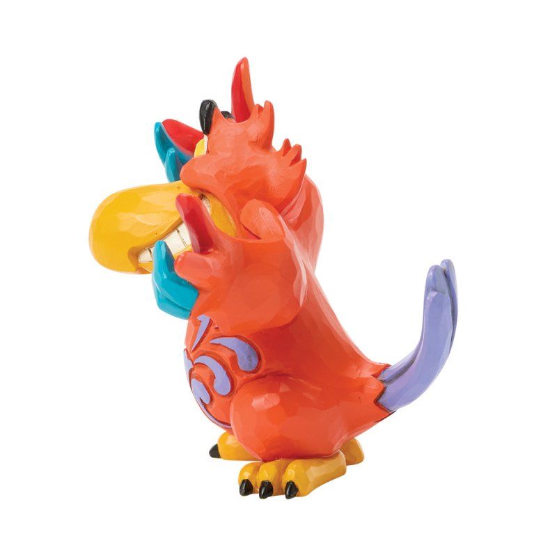 Beeldje van Iago, de rode papegaai uit Aladdin, lachend met een gele snavel.