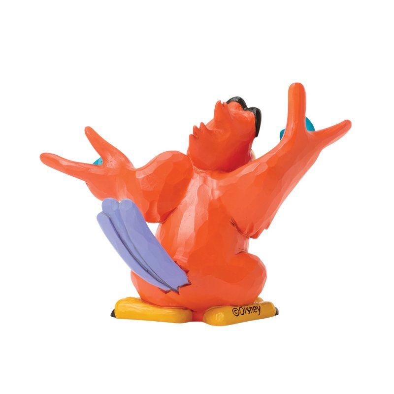 Een oranje, cartoonesk vogelbeeldje met uitgestrekte vleugels en blauwe accenten, zittend op een gele ondergrond.