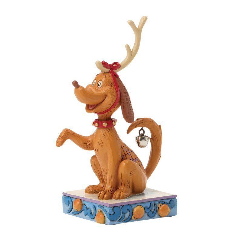 Een beeldje van Max de hond uit How the Grinch Stole Christmas, met gewei, rode halsband en belletje aan zijn staart.