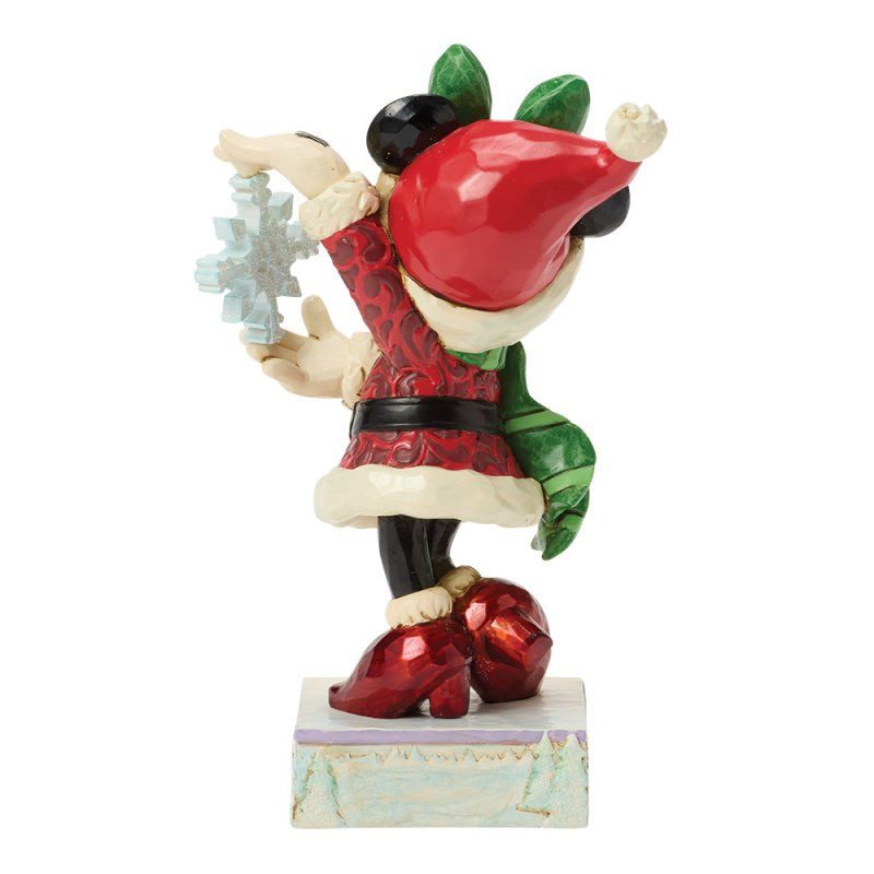Minnie Mouse-figuurtje in kerstmanpak met een sneeuwvlokje. In de kleuren rood, groen en wit.