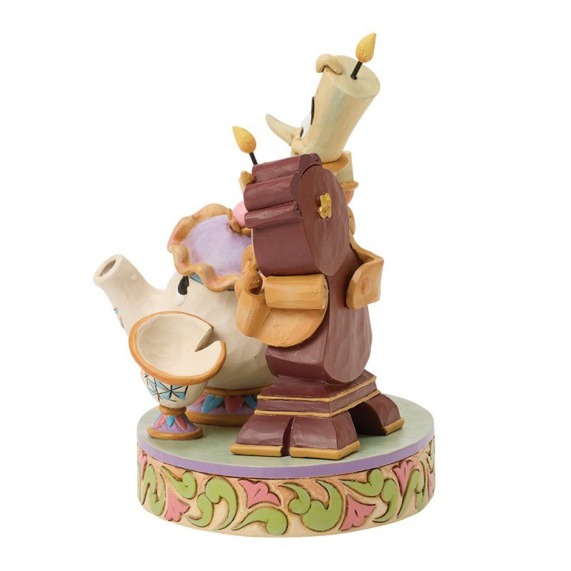 Beeldje van mevrouw Potts en Lumière uit Belle en het Beest. Beige theepot en bruine kandelaar op een decoratieve voet.