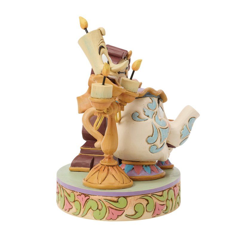 Figuurtjes van de personages uit Disney's Belle en het Beest: Lumière, Mrs. Potts, Cogsworth en Chip.