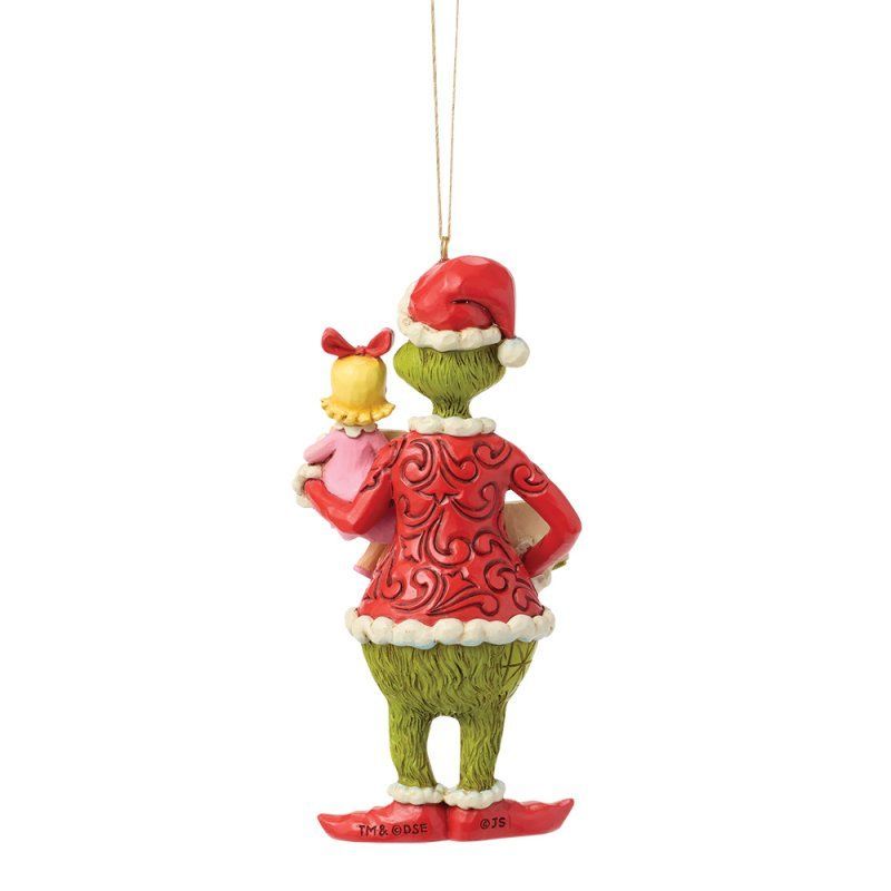 Een Grinch-ornament dat een Who vasthoudt. Rood en groen met een kerstmuts.