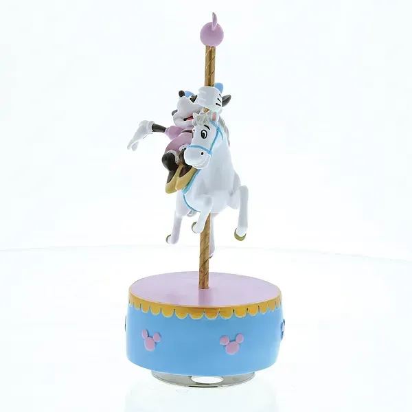 Minnie Mouse en een vriendinnetje rijden op een wit carrouselpaard; muziekdoosje met blauwe en roze accenten.