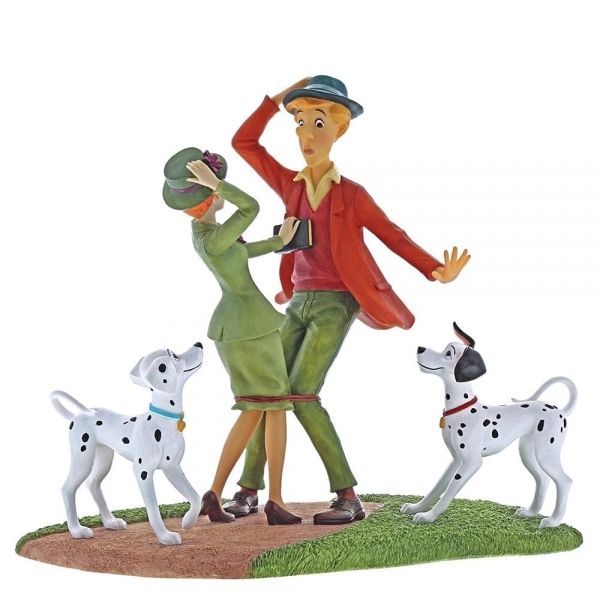 Beeldje van twee dansende mensen en twee dalmatiërs.