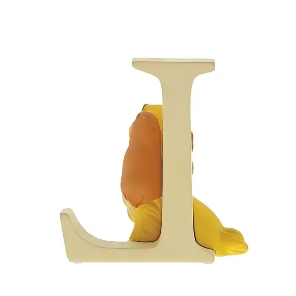 Gele L-vormige plank met opgezette leeuwenkop en -lichaam.