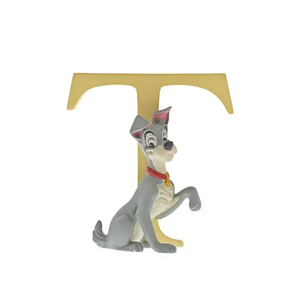 Het beeldje van hond Tramp met een gouden 