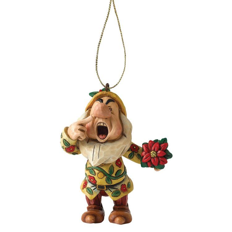 Een kerstornament van Grumpy de Dwerg, schreeuwend, met een kerstster.