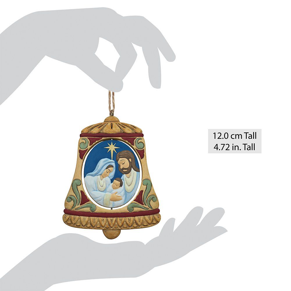 Kerststalbelornament met Maria, Jozef en het kindje Jezus, die in silhouethanden worden vastgehouden; bruin en blauw.