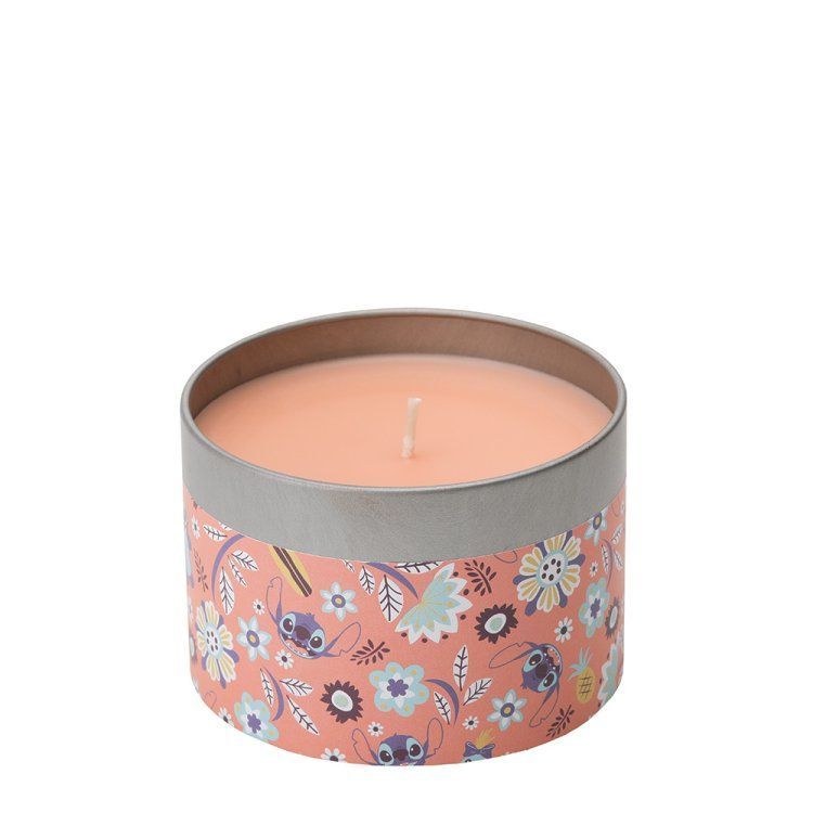 Kaars met bloemenmotief in een ronde houder; roze was, grijze rand.