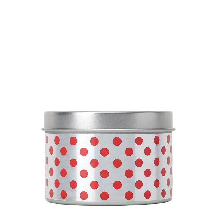 Geurkaars met Minnie Mouse-geur in een wit blikken doosje met rode stippen.