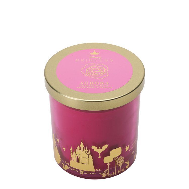 Roze kaars met gouden deksel en Disney-kasteelmotief.
