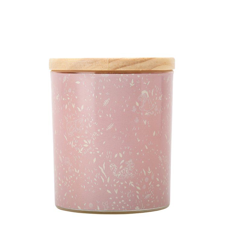 Roze gespikkelde kaarsenhouder met houten deksel.