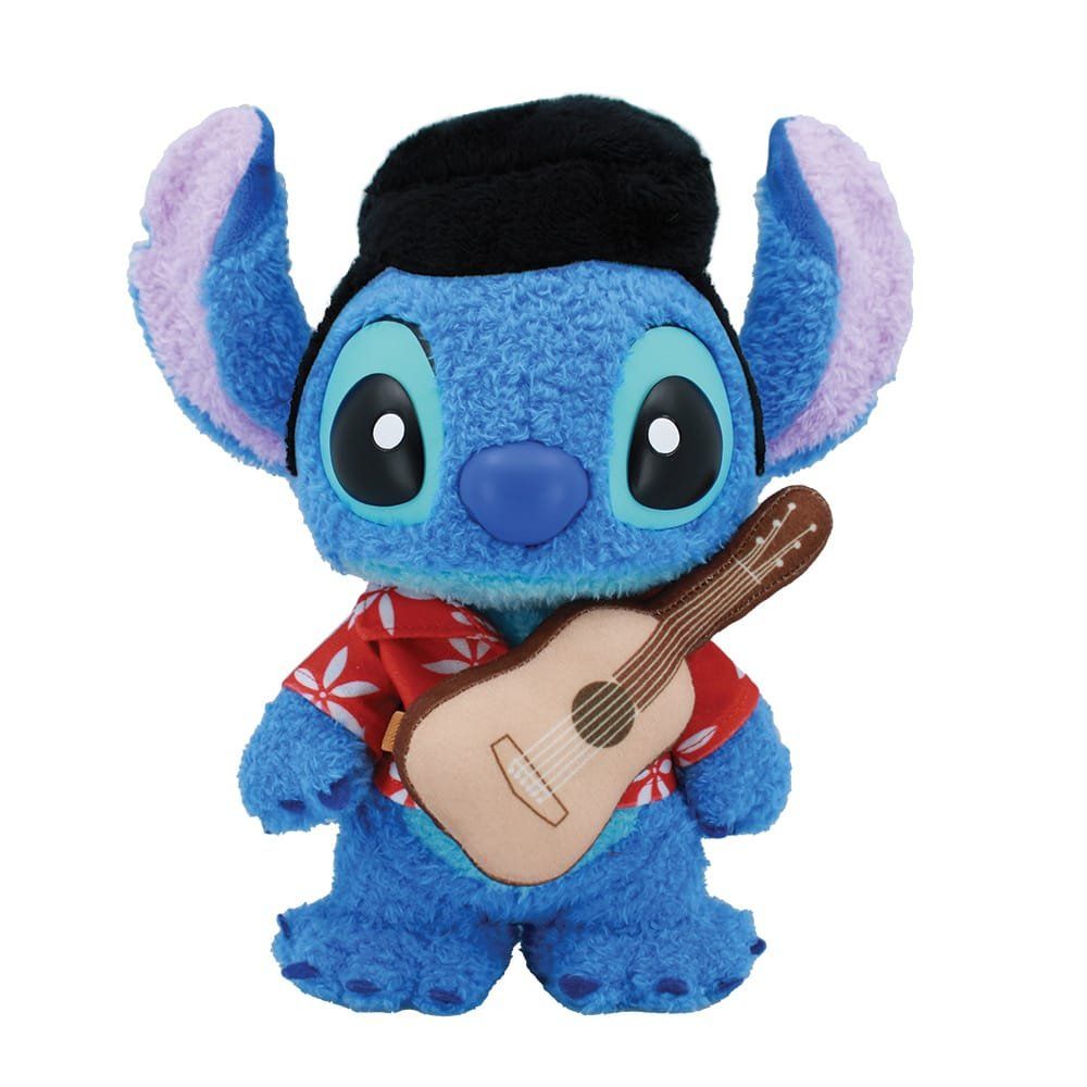 Een pluche Stitch-beestje verkleed als Elvis, met een rood shirt en een ukelele.