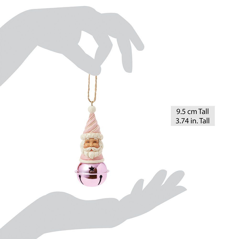 Roze kerstmanornament met belvoet en gouden koord.
