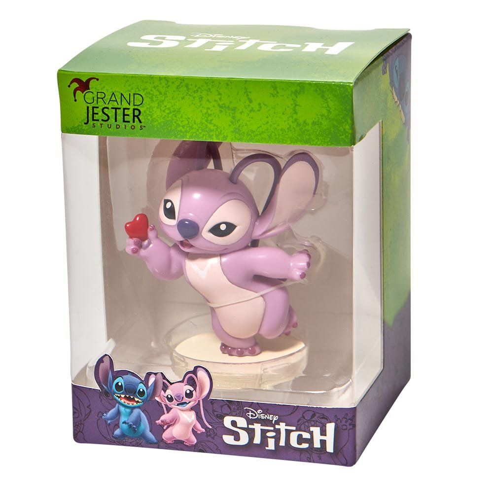 Engeltje in een doosje, met een rood hartje in haar hand. Paars en wit, van het merk Disney Stitch.