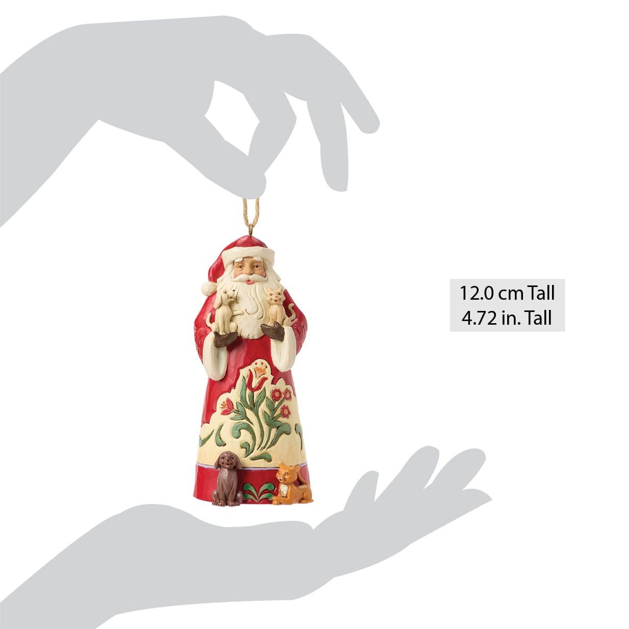 Kerstornament met de kerstman, twee puppy's en twee andere honden; rood en beige met bloemdetails.