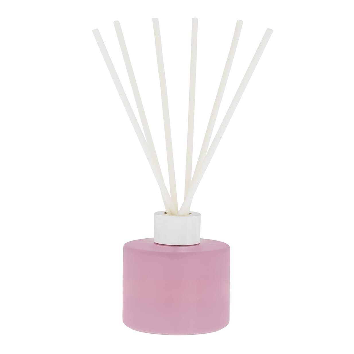 Roze etherische olie diffuser met witte rietjes.