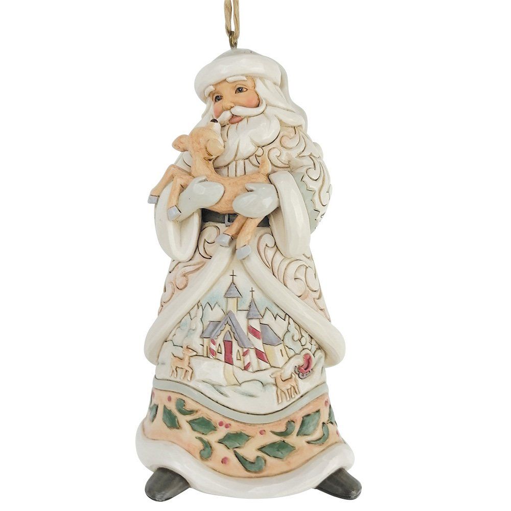 Een kerstornament van de Kerstman met een reekalfje in zijn armen, met een winters dorpje op zijn jas.