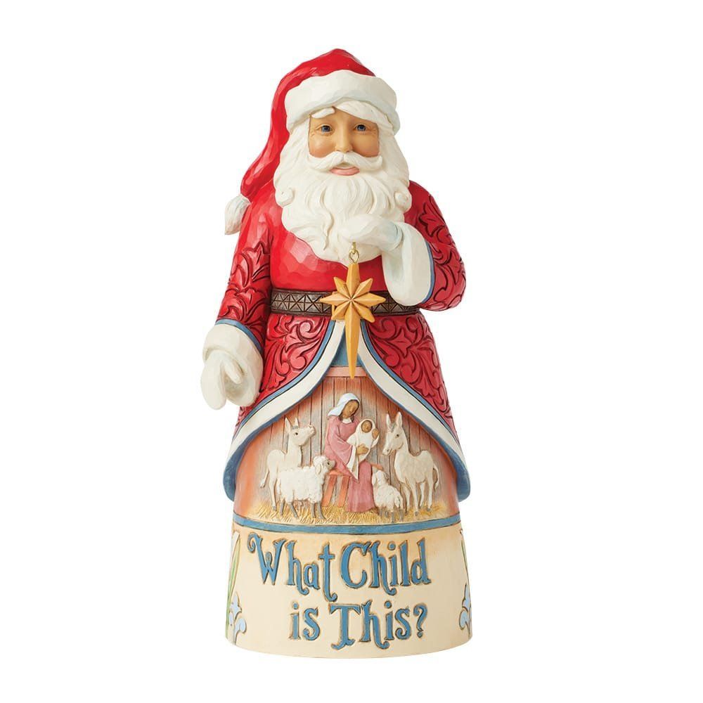Een kerstmanfiguur in rode jas, met zijn hand voor zijn gezicht. Het beeldje toont een kerststal en de tekst