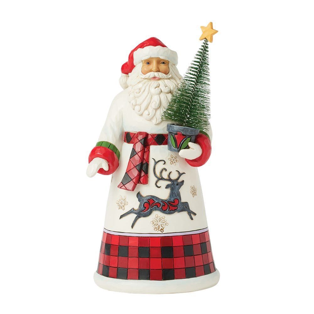 Figuurtje van de Kerstman met een klein kerstboompje; crèmekleurige jas, rode wanten en muts, buffelruitpatroon.