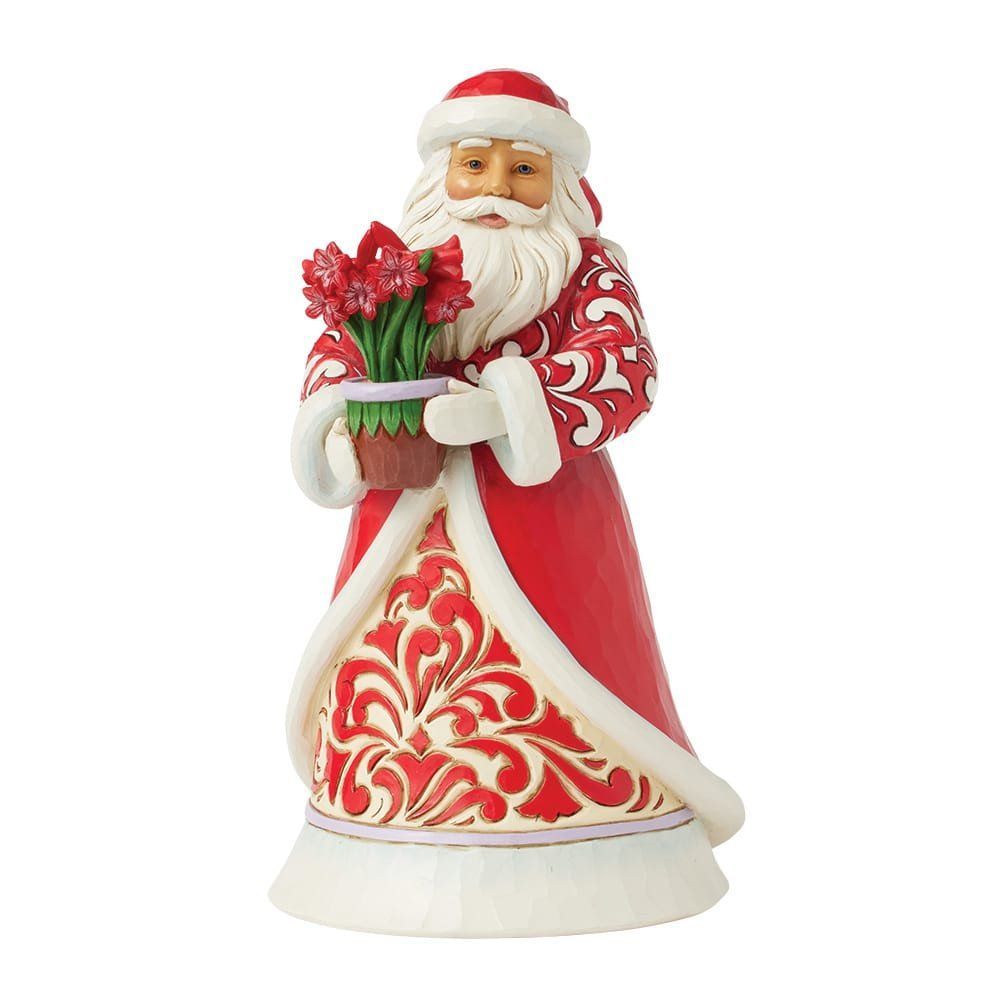 Een kerstmanfiguur met een pot rode bloemen in zijn hand, gekleed in een rode jas met witte biezen.