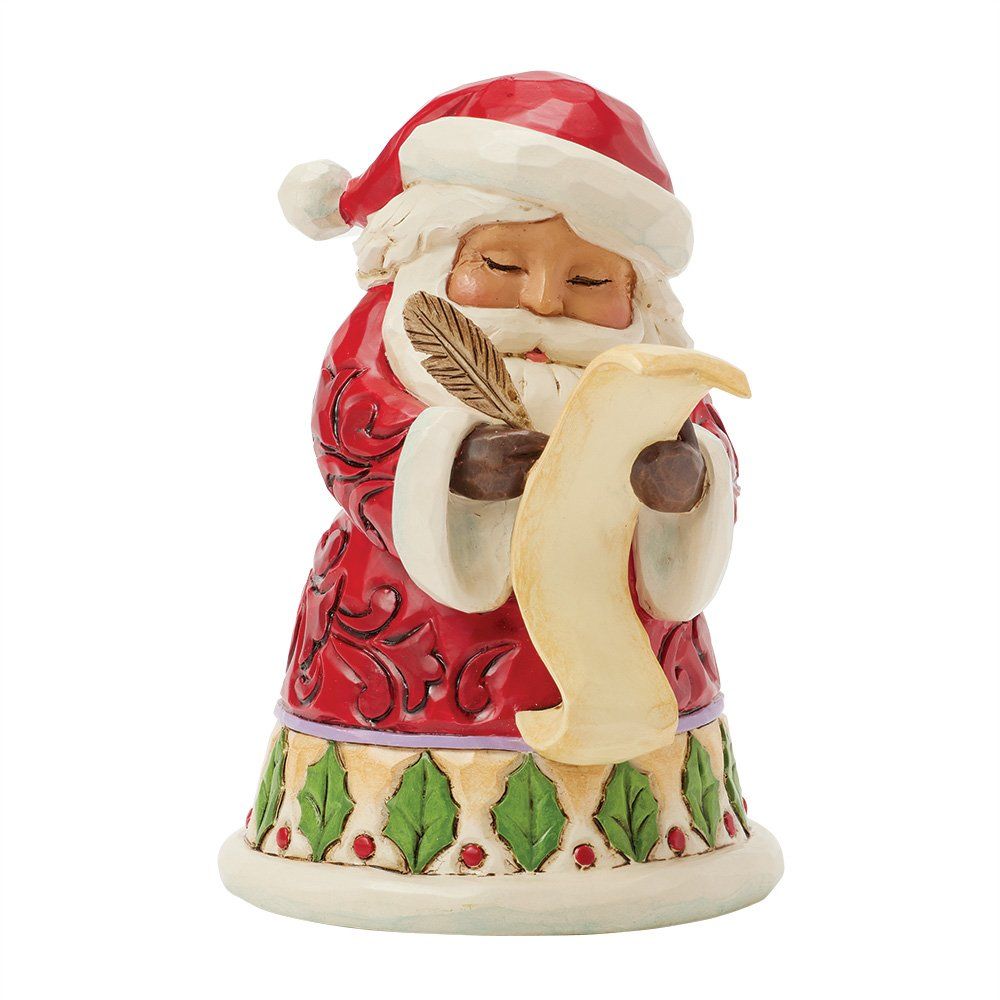 Een kerstmanfiguurtje dat een lijstje schrijft, gekleed in een rode jas met witte bies, en een veer vasthoudt.