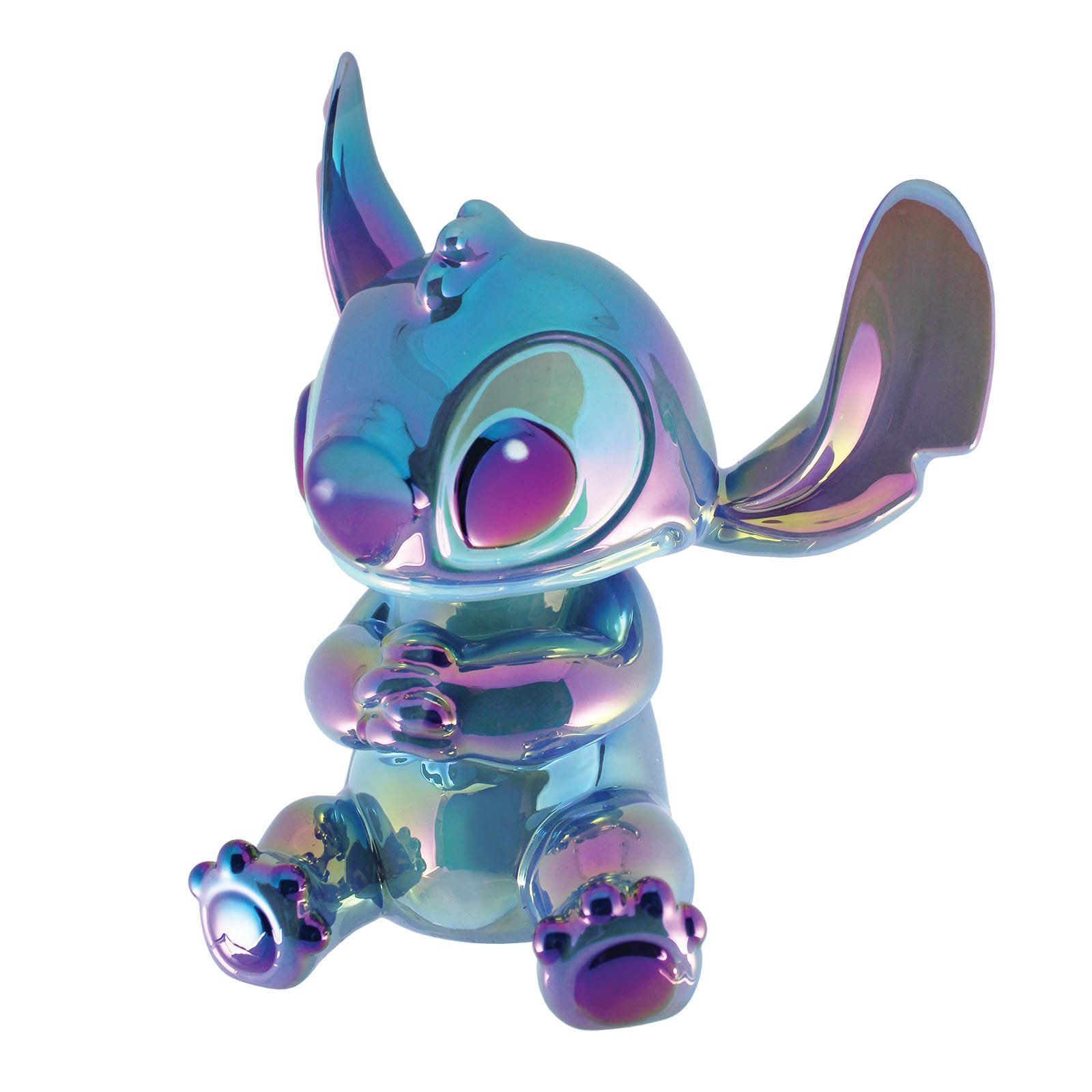 Metalen, iriserende Stitch-figuur, zittend, handen ineengevouwen, grote ogen, oren omhoog.