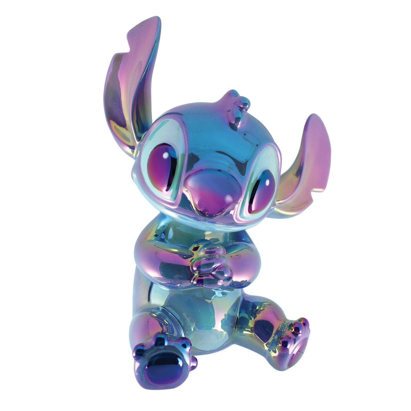Metalen, iriserende Stitch-figuur, zittend, handen ineengevouwen, grote ogen, oren omhoog.