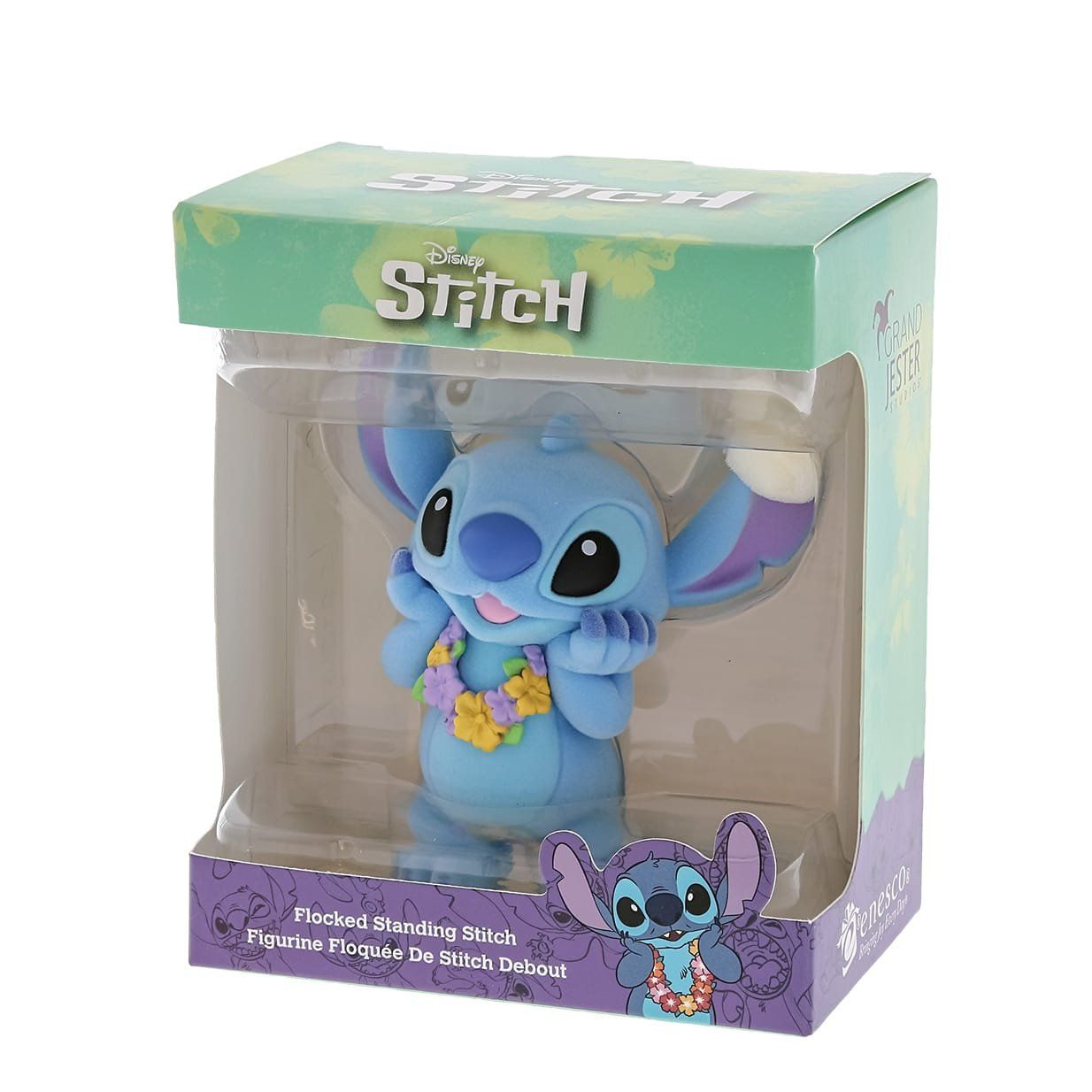 Een Stitch-figuurtje in een doos, met een bloemenkrans om zijn nek. Een blauw, lachend buitenaards wezen, dat zijn kin vasthoudt, in een doos met groene en paarse accenten.