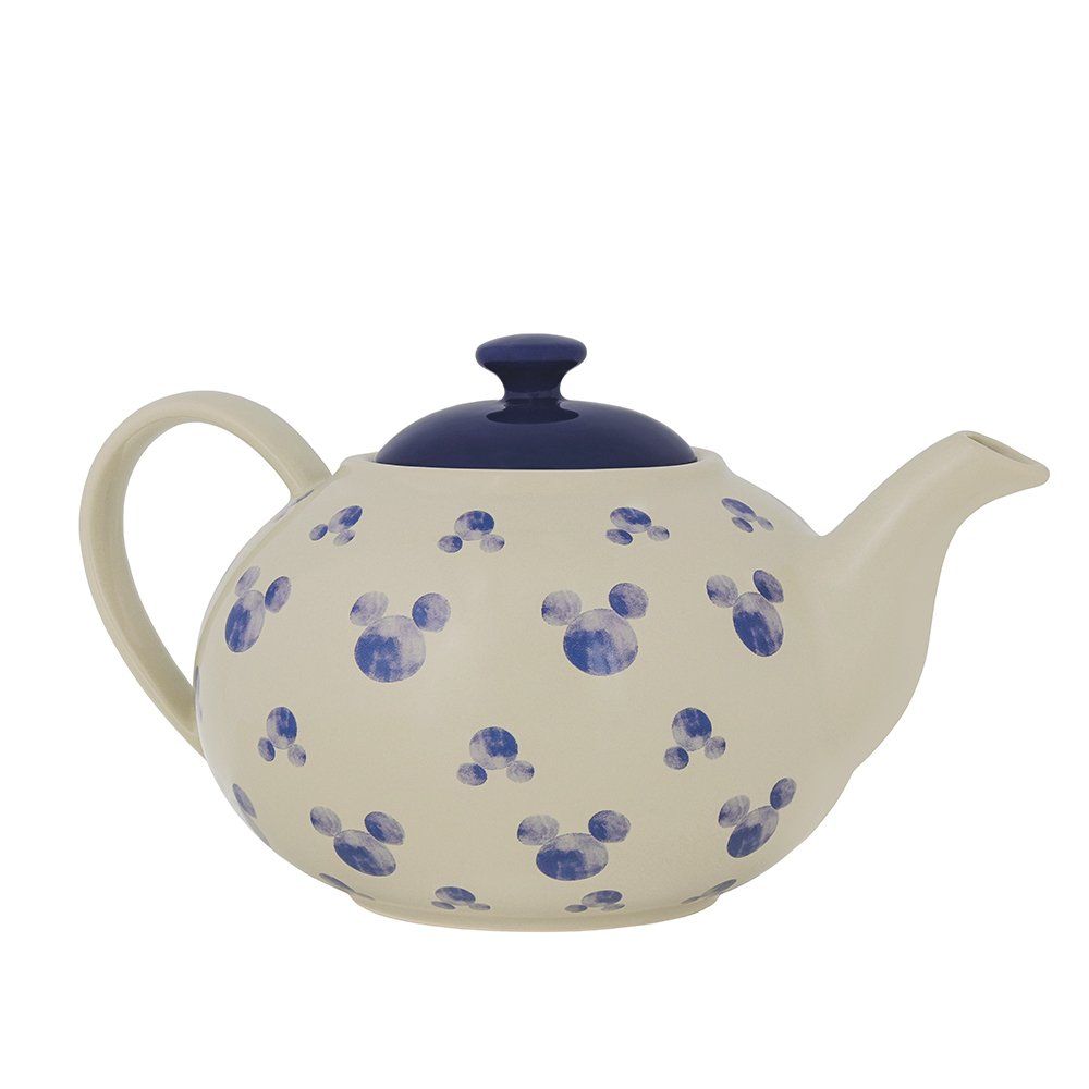 Witte theepot met blauwe Mickey Mouse-silhouetten en een donkerblauw deksel.