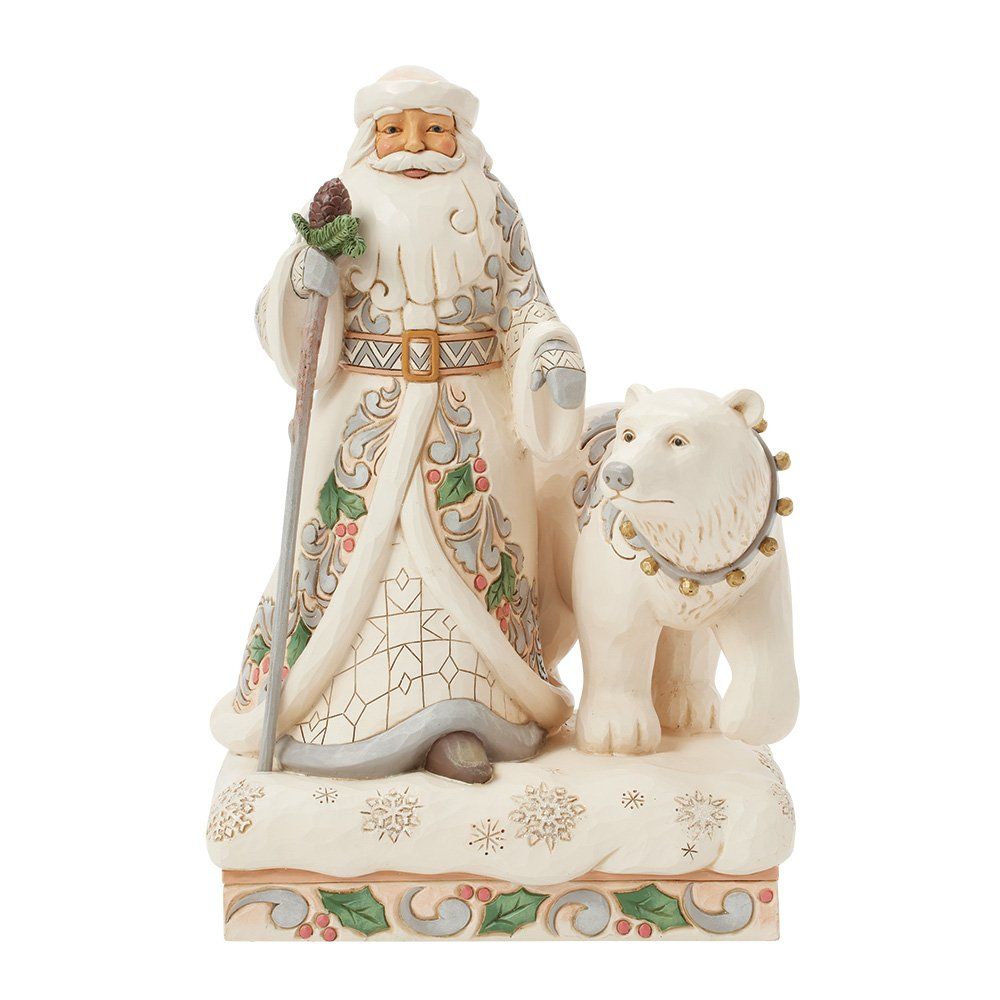 De kerstman met witte baard, staf en ijsbeer op een besneeuwde achtergrond, gekleed in een jas met patroon.