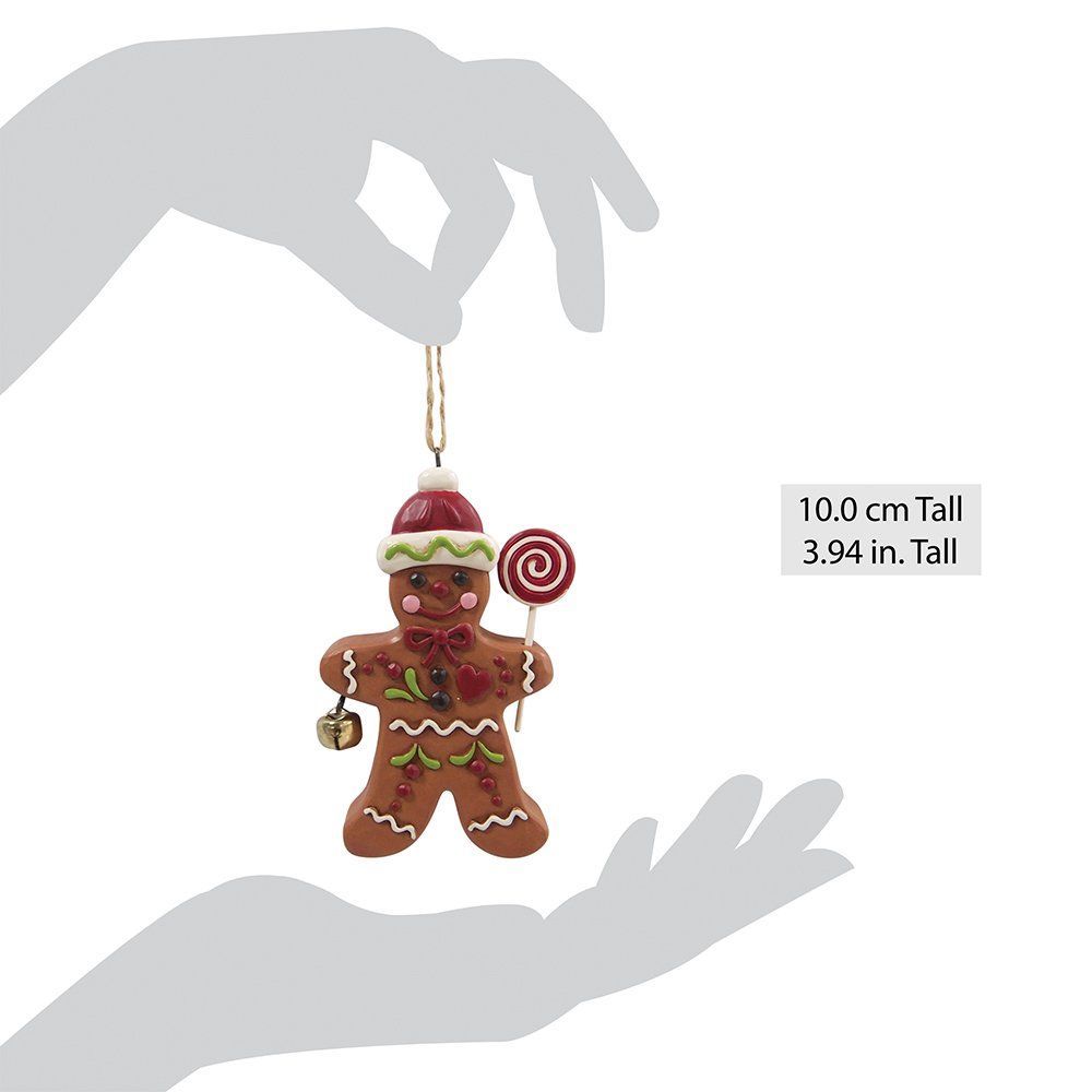 Kerstornament in de vorm van een peperkoekmannetje met lolly en belletje.