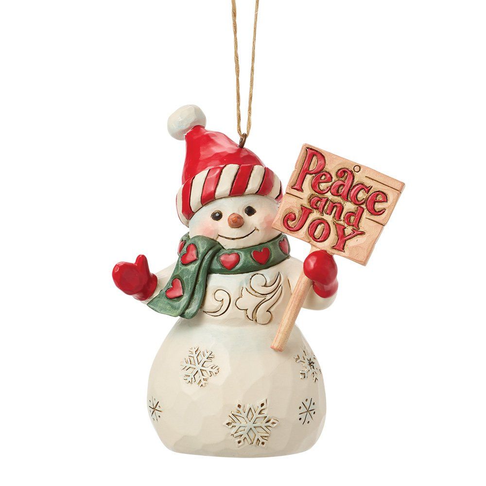 Een sneeuwpopfiguur met een bordje