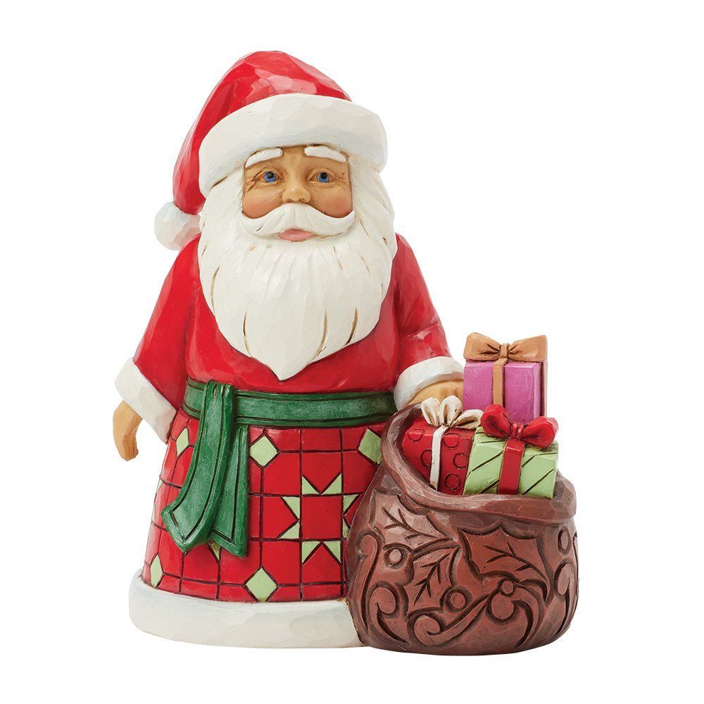 Een kerstmanfiguur met een zak vol cadeaus, in een rood-wit pak, lachend.