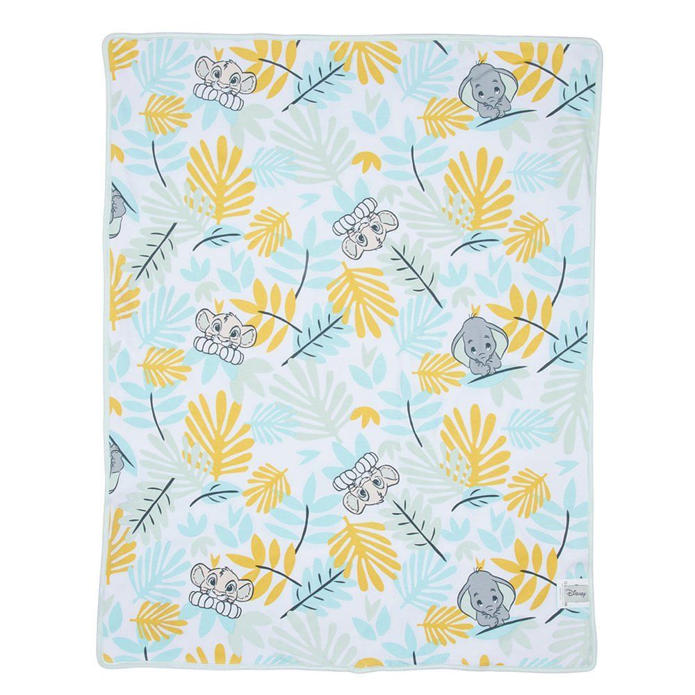 Witte babydeken met gele en blauwe blaadjes en grijze olifantjes.