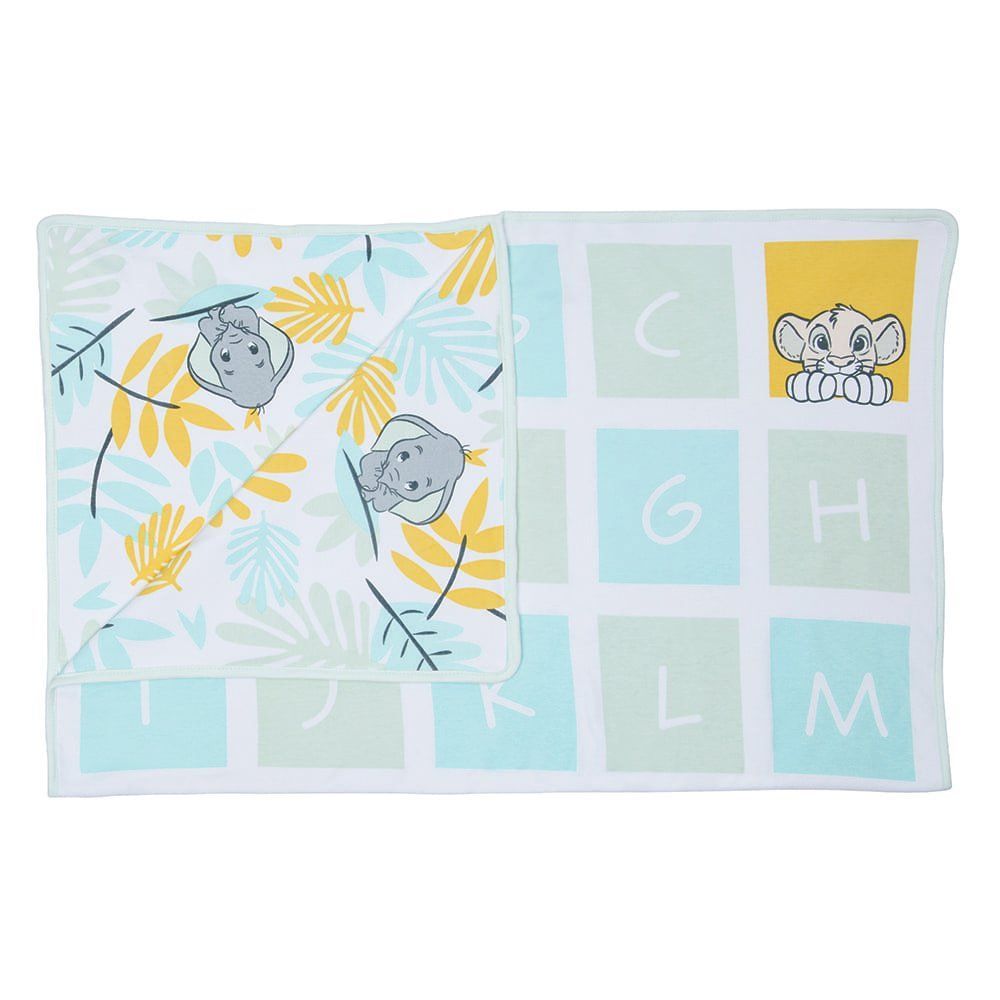Witte babydeken met gele en blauwe blaadjes en grijze olifantjes.
