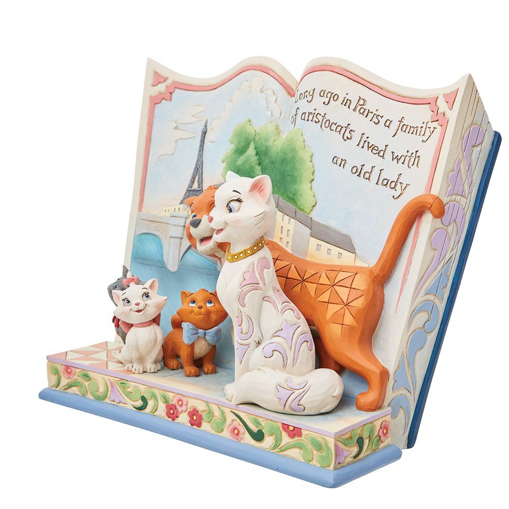 Figuurtje van Aristocats in een boek; katten in Parijs, oranje, wit en grijs.