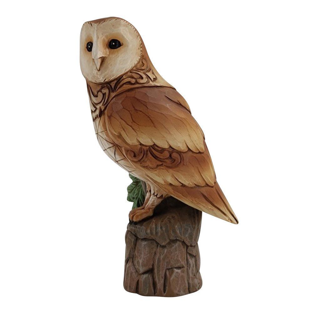 Beeldje van een kerkuil, zittend op een houten stronk. Crème-, bruin- en beigetinten, met gedetailleerde houtsnijwerken.