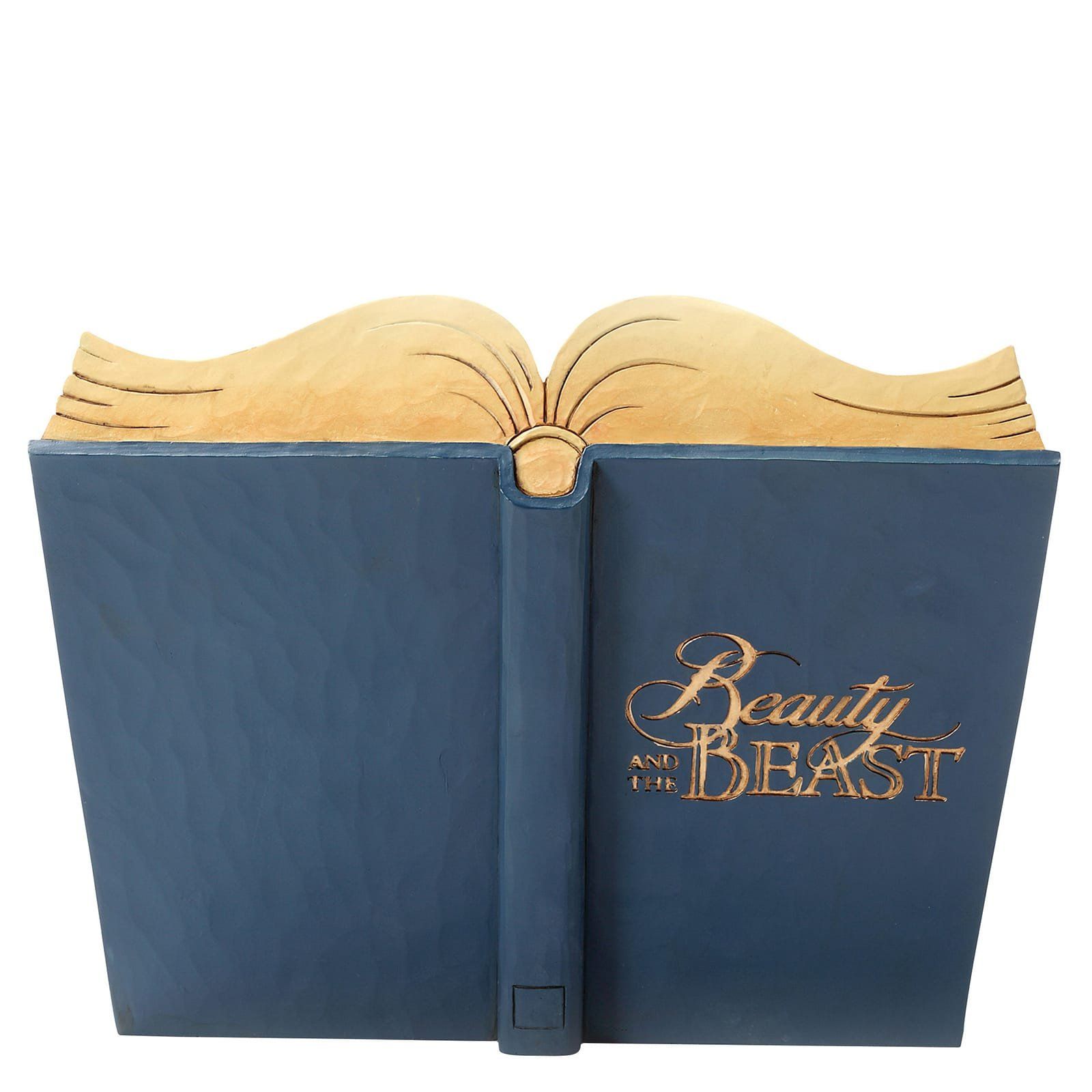Een beeldje van Belle en het Beest in een open boek met de tekst