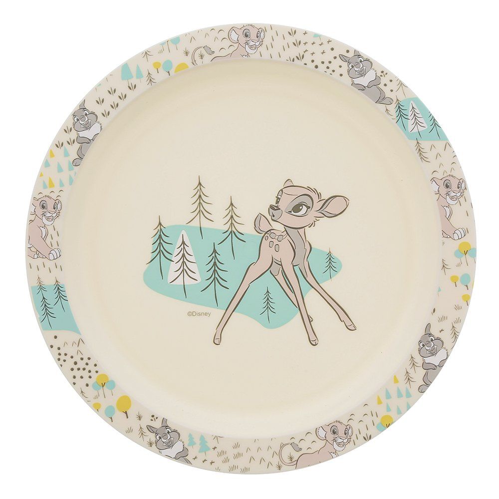 Bord met Bambi en een hert in een boslandschap; crèmekleurige en pastelkleuren. Rand met dieren- en boommotief.