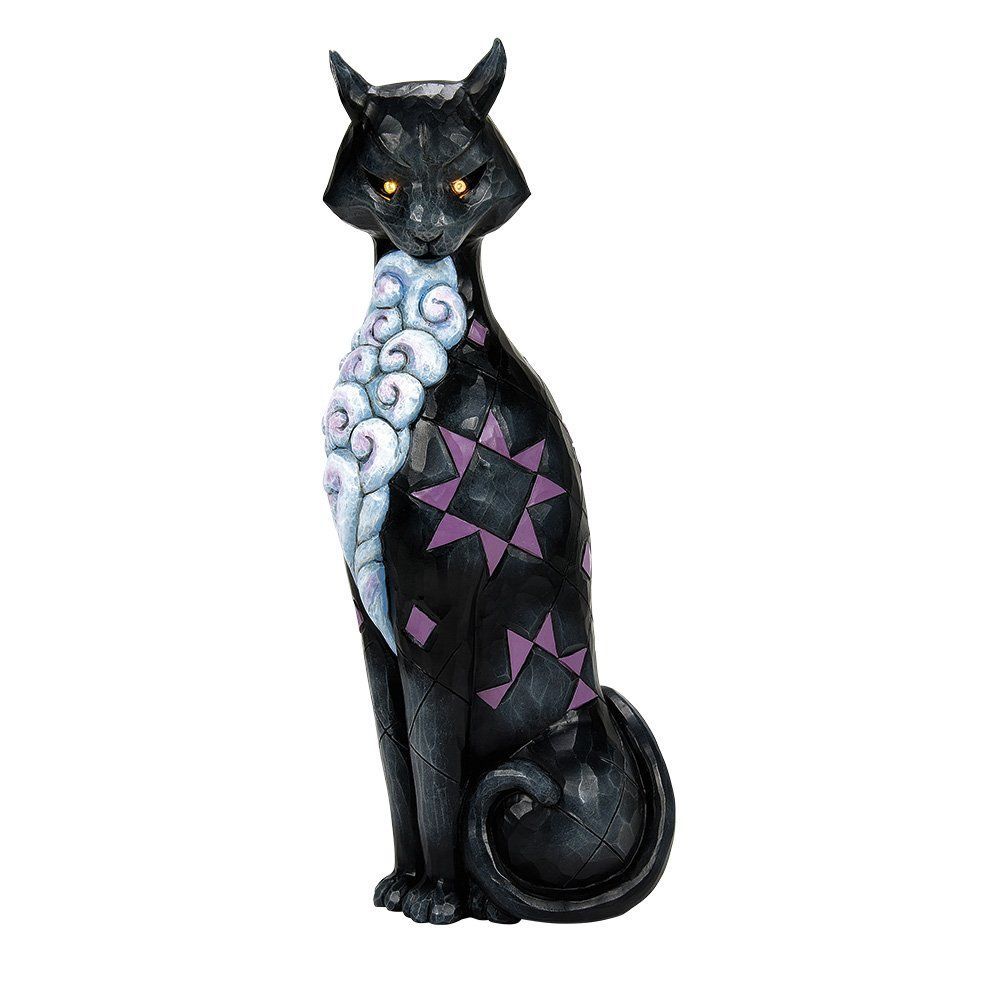 Beeldje van een zwarte kat met wolkjes en sterren als accenten.