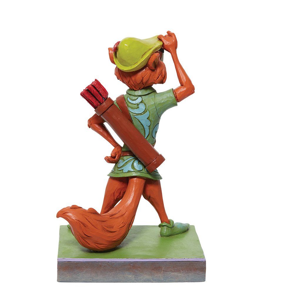 Robin Hood-beeldje, een oranje vos met groene tuniek en hoed, die een boog vasthoudt en naar boven kijkt.
