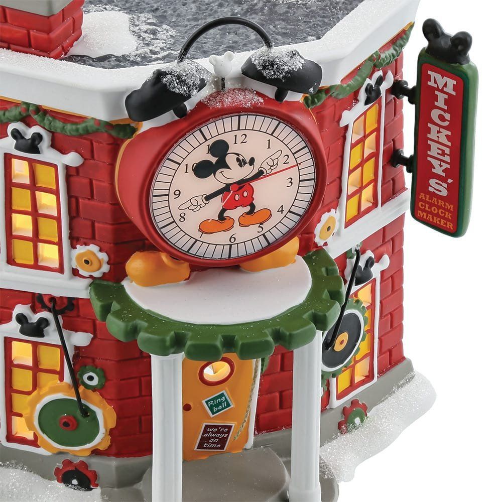 Een kerstversiering van Mickey Mouse's klokkenwinkel, met een grote klok waarop Mickey's afbeelding staat.
