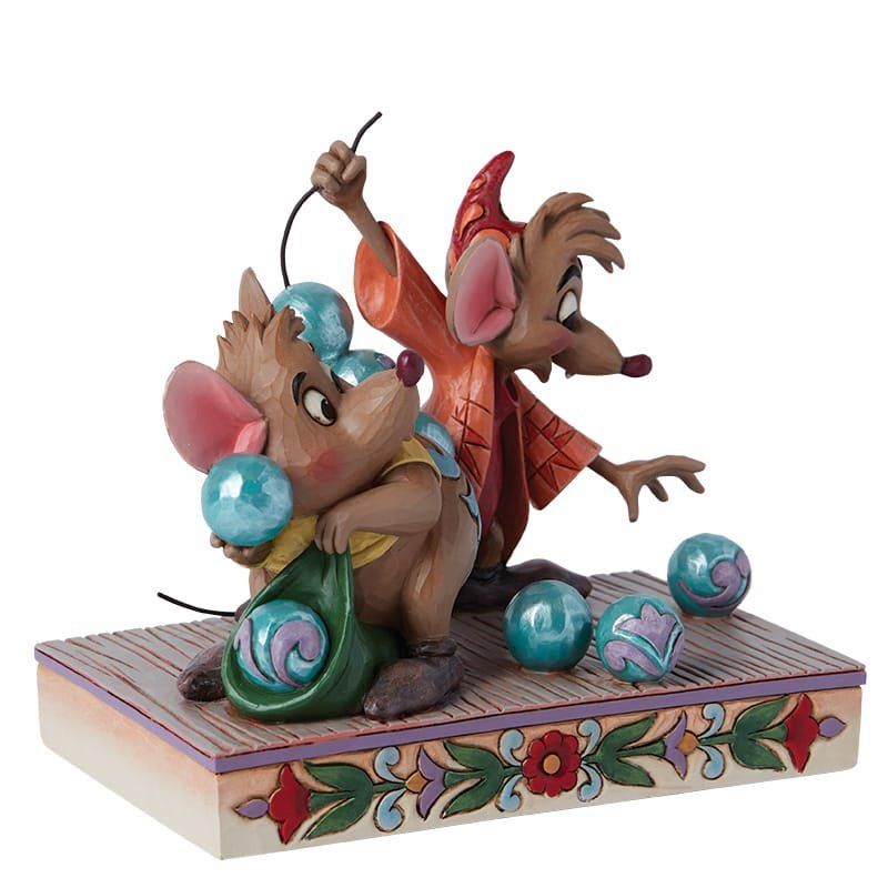 Assepoesters muisvriendjes, Jaq en Gus, met knikkers. Jaq heeft een zak vast, Gus een touwtje. Kleurrijke achtergrond.