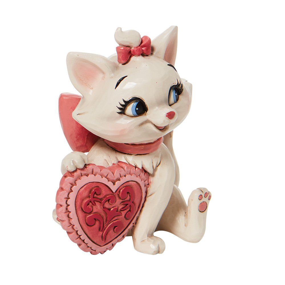 Een beeldje van Marie de Aristocats, de kat met een roze hartje.