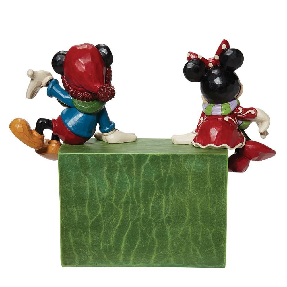Een kerstcountdownfiguurtje van Mickey en Minnie Mouse, waarop staat dat er nog