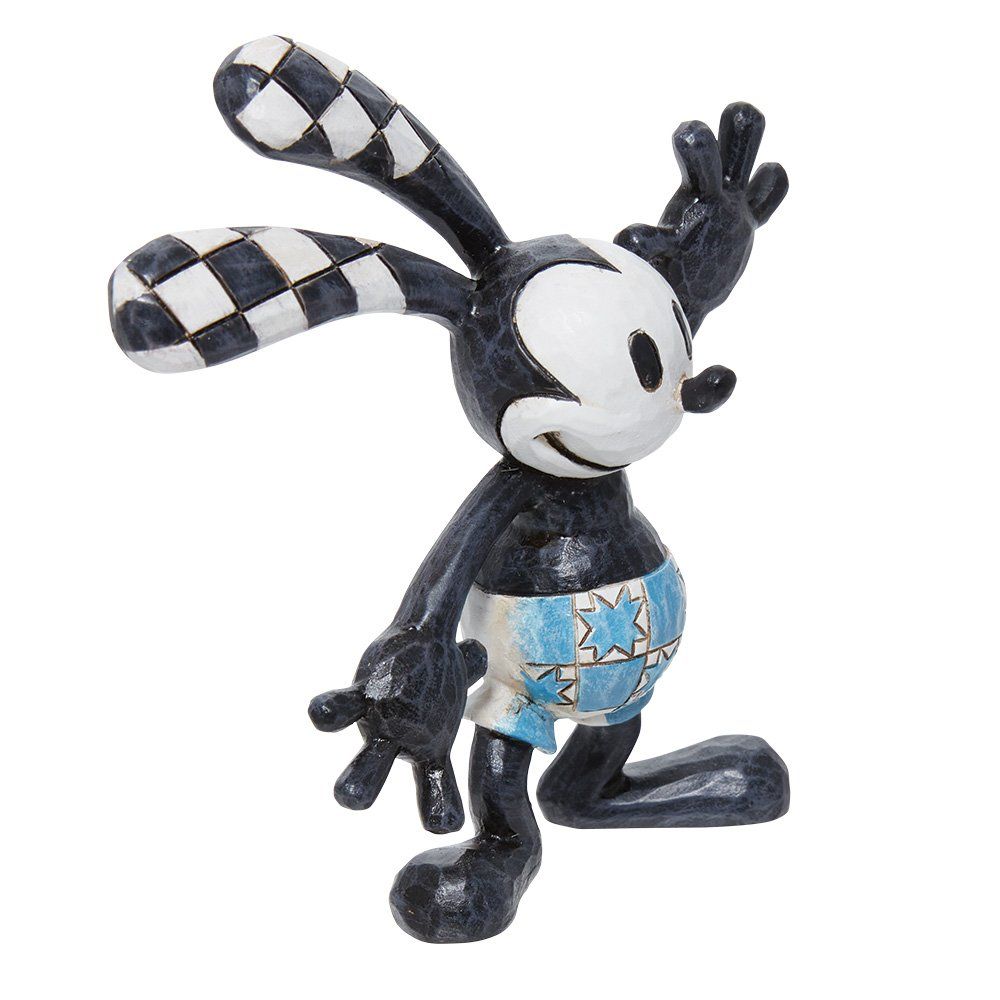 Figuurtje van Oswald het Gelukskonijn in zwart, wit en blauw, in een pose.